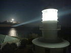 夜の室戸岬灯台と月